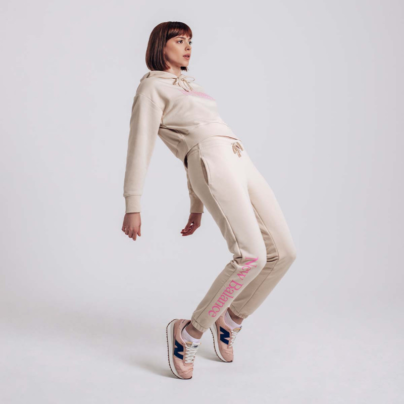NEW BALANCE Donji dio trenirke NB Essentials Celebrate Fleece Pant 